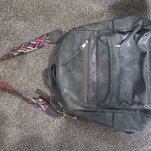 Stylish Gray Backpack with Colorful Strap